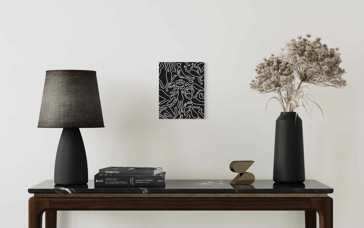 This piece gives the emotion of a black void with characters drawn in white outline falling into it, This represents Yang light activity and warmth. hung on wall with background