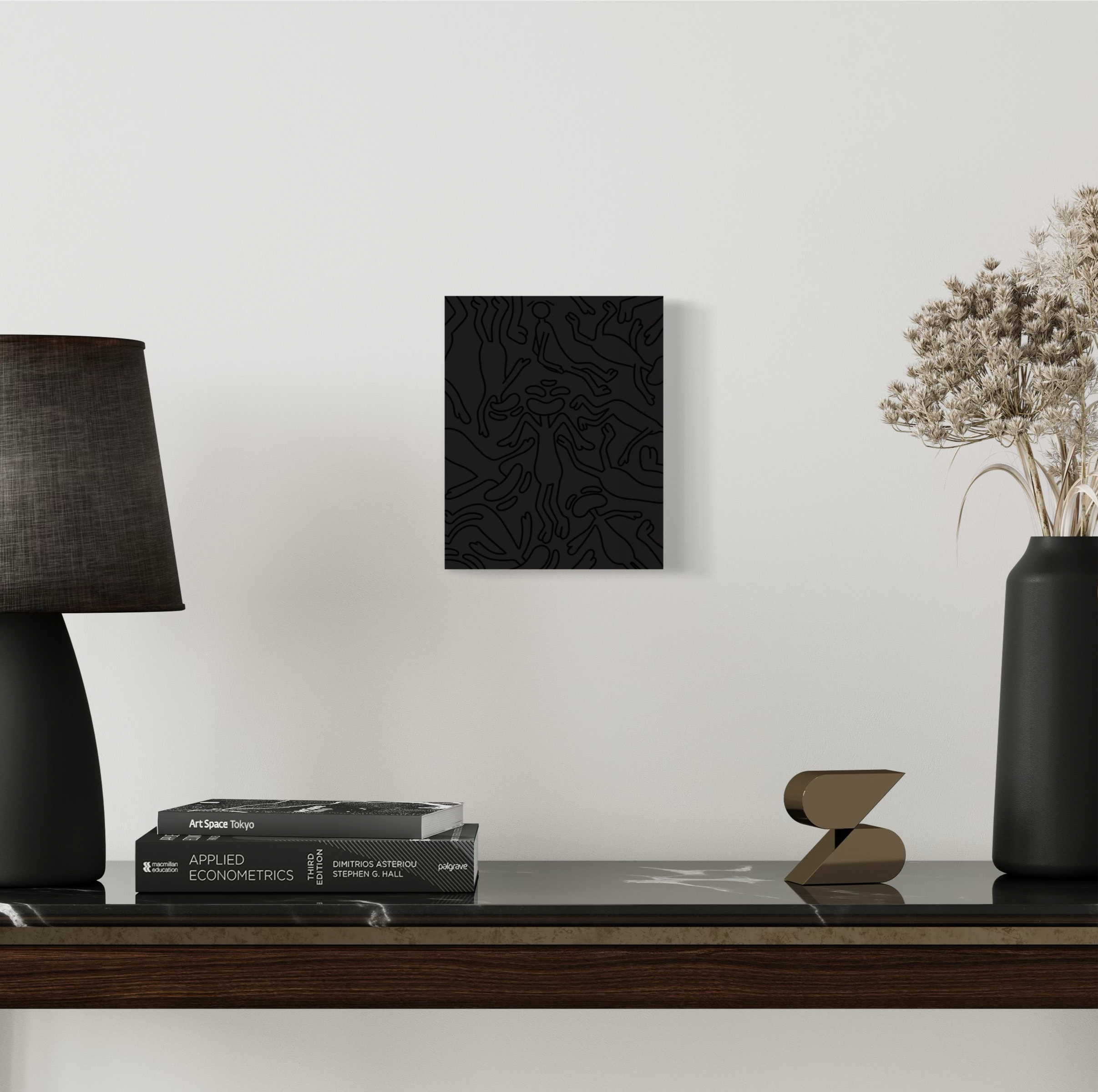 This piece gives the emotion of a black void with characters drawn in black outline falling into it, This represents Yin dark passive and cold. hung on wall with background 
